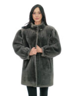 Sheepskin coat long sleeves narrow cuffs 50 cm long 80cm button at the neck piping