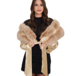 Beige fox stole with visible band lining and gold sleeves and gold laces to close